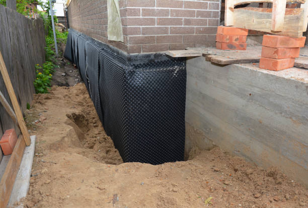 Happy homeowners after waterproofing job in Hartford City